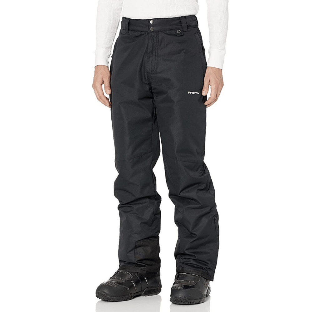 Black snow pants with a logo on the right thigh, worn with black winter boots.