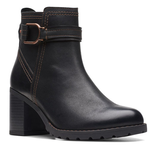 Black ankle boot with a block heel, strap, and buckle detail, featuring contrasting stitching.
