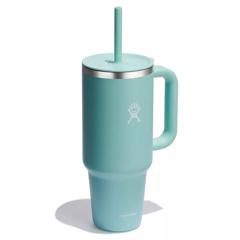 A turquoise mug with a handle and straw, featuring a Hydro Flask logo.