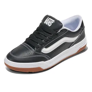 A black Vans sneaker with a white stripe, gum sole, and white midsole. Features a perforated toe box and a padded collar for comfort.