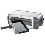 A Ninja rapid oven with digital controls, featuring functions for baking, broiling, reheating, toasting, and defrosting. A removable tray with a handle is partially inserted.