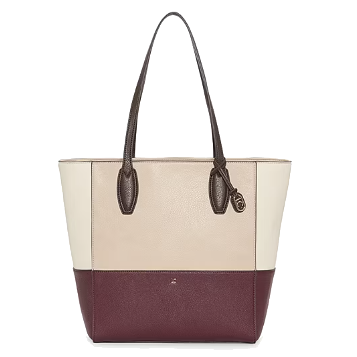 A tricolor tote bag with dark brown handles and a small metallic logo on the burgundy bottom section, complemented by cream and beige panels above.