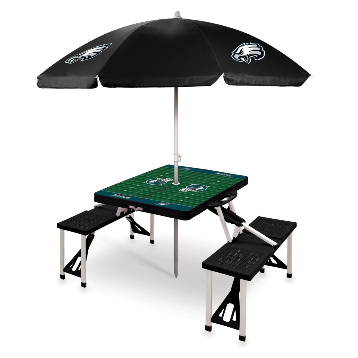 Folding picnic table with attached benches, featuring a football field design and black umbrella with eagle logos.