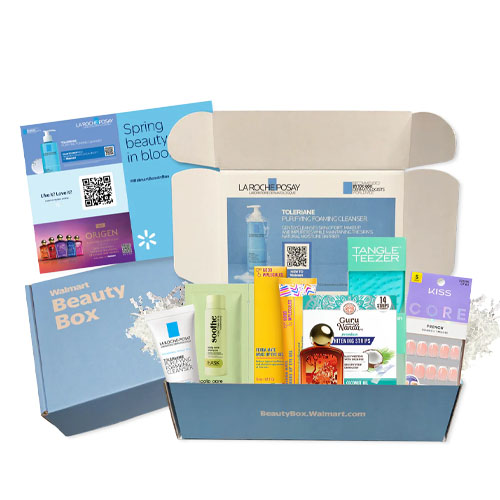 Walmart Beauty Box containing La Roche-Posay Toleriane Cleanser, OGX shampoo, Curel lotion, Tangle Teezer, KISS false nails, and assorted samples.