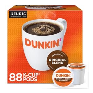 Dunkin' Original Blend K-Cups, 88-count, for Keurig brewers, feature a medium roast coffee. The packaging is orange with a white Dunkin' logo, showing a coffee cup filled with dark coffee.
