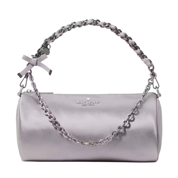 A metallic silver Kate Spade New York barrel bag featuring a chain strap and a small bow accent.