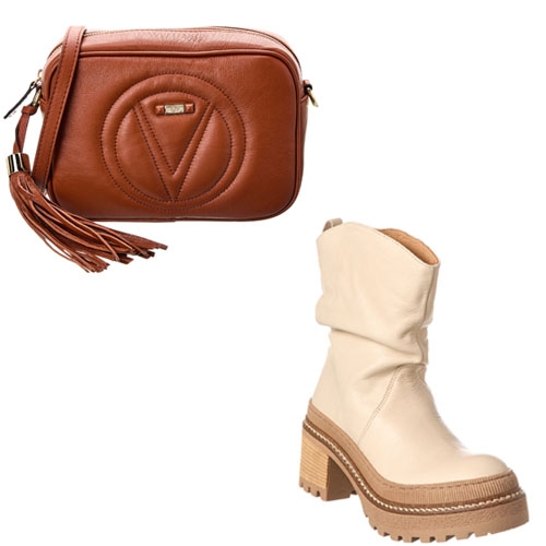 A brown tasseled shoulder bag and a cream-colored chunky heeled boot.