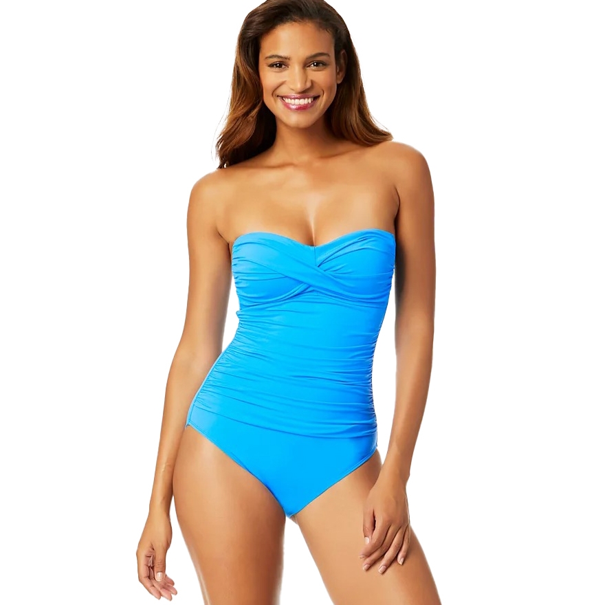 A woman is wearing a bright blue strapless one-piece swimsuit with a ruched design. She's smiling and posing, showcasing the swimsuit's fit and style.