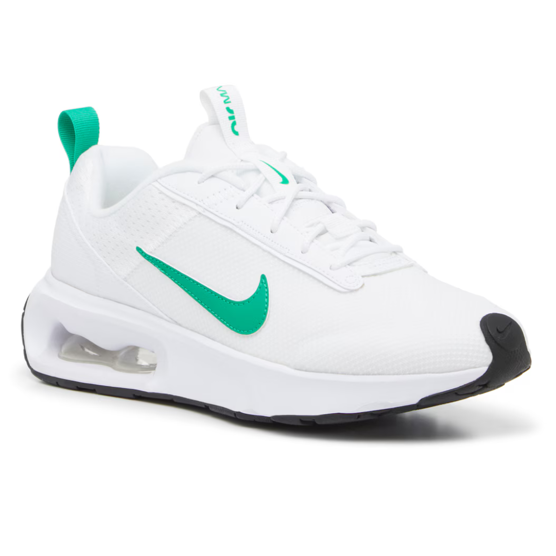 White sneaker with green swoosh logo and visible air cushion in the heel.
