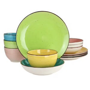 16-piece dinnerware set includes a variety of dishes in vibrant colors: light green, yellow, blue, pink, and white. The set features plates, bowls, and cereal bowls with a speckled design and dark rim accents.