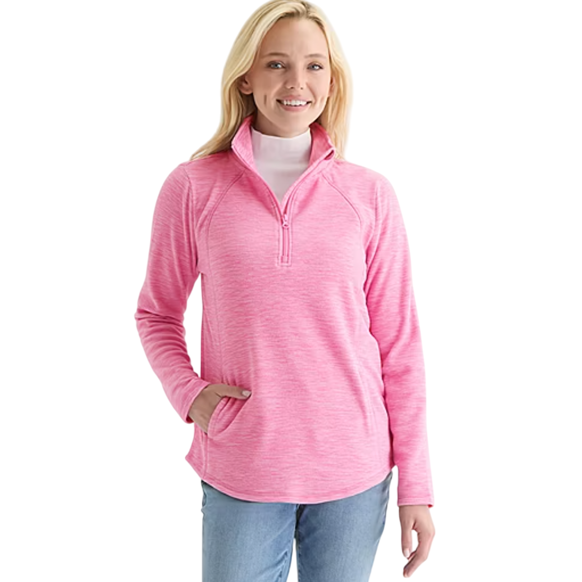 Woman wearing a pink quarter-zip pullover with a white turtleneck underneath and light blue jeans. The pullover features a front pocket and a relaxed fit.