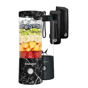 Portable blender with a marble design, filled with layered fruits like blueberries, kiwis, bananas, peaches, and strawberries; includes a carrying pouch.