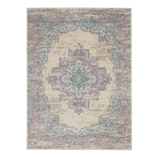 A rectangular area rug with a distressed, vintage-style design featuring a central medallion pattern in shades of pink, blue, and beige.