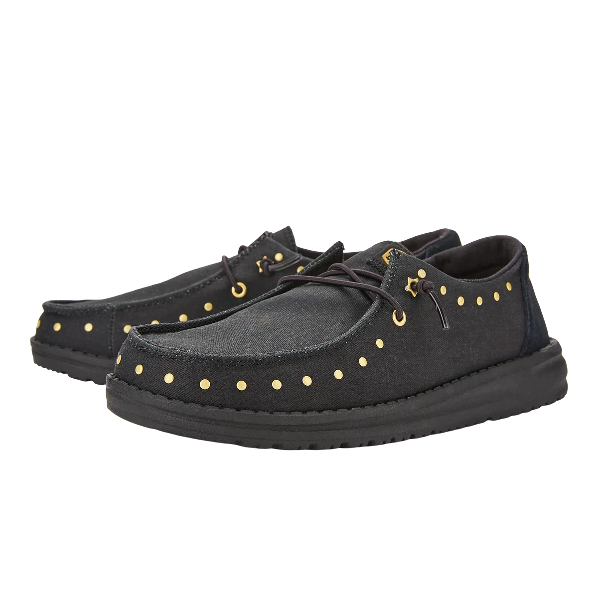 Black canvas shoes with gold-tone eyelet detailing and laces.