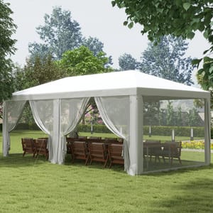 10' x 20' party tent with a white canopy and mesh curtains, set up over a dining area with wooden chairs and tables on a grassy lawn, surrounded by trees and shrubs.