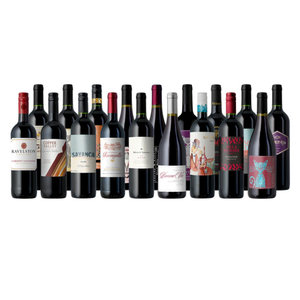 A collection of assorted red wine bottles, featuring various labels and designs, in a neatly arranged lineup.