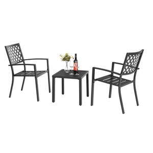 A black metal outdoor furniture set featuring two lattice-back chairs and a square table. On the table are a bottle of wine, two wine glasses, and a small vase with flowers.