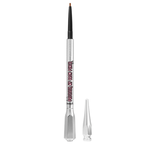 An eyebrow pencil with a silver body, labeled \“Precisely, My Brow Pencil\“ from Benefit Cosmetics, featuring a very fine tip for detailed application and a removable cap.