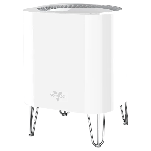 A white Vornado air purifier with a cylindrical design, metallic legs, and Vornado logo on the front.