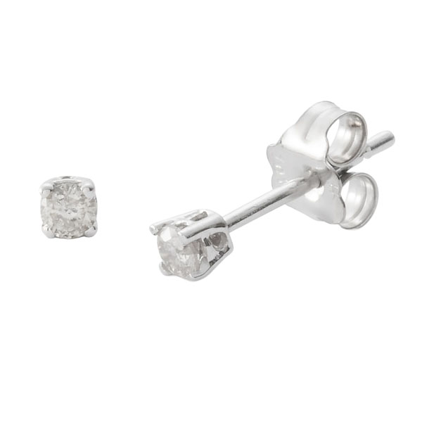 A pair of silver stud earrings featuring small round-cut clear stones, set in a simple prong design with butterfly backs.