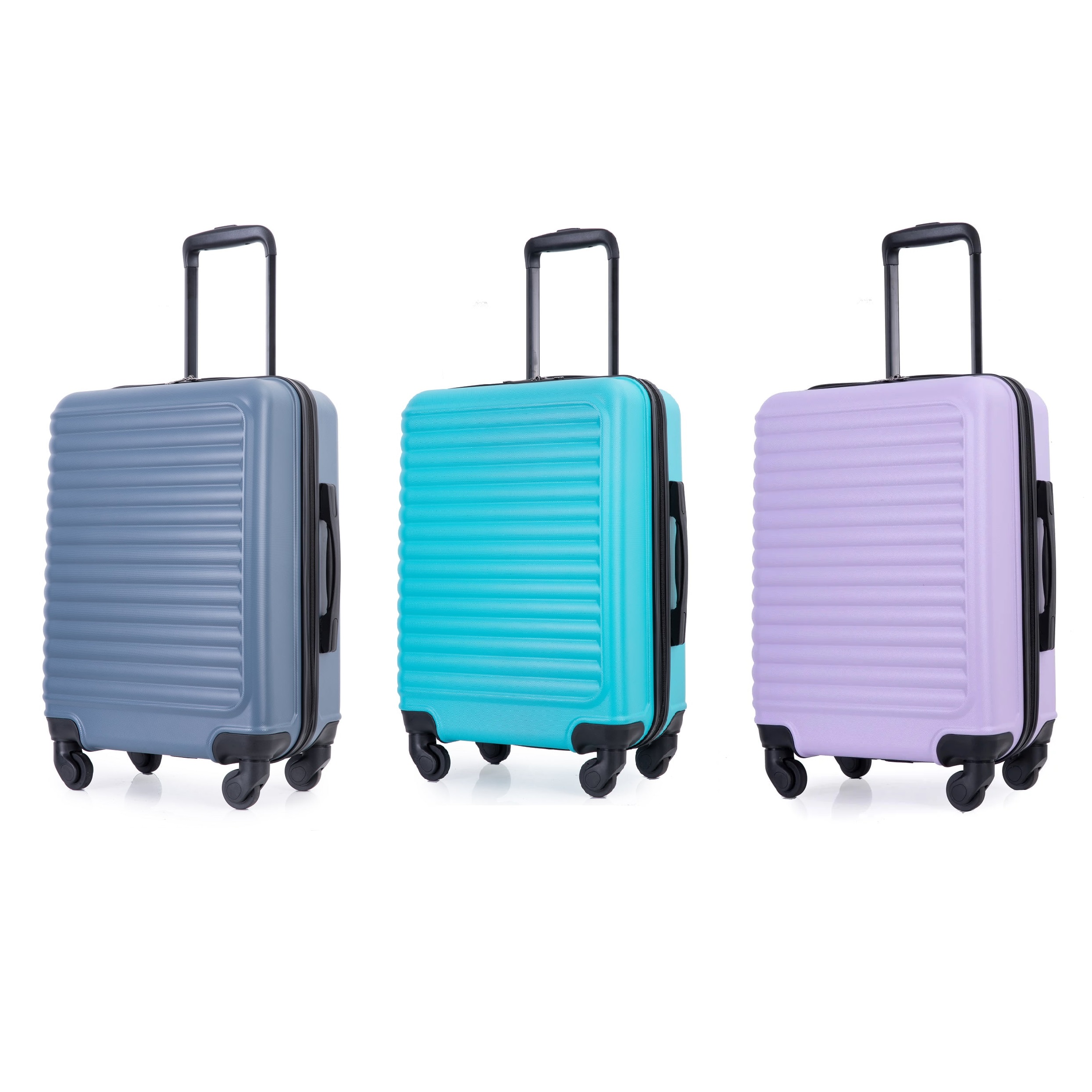 Three hard-shell suitcases with telescoping handles and wheels, in grey, teal, and lilac colors.