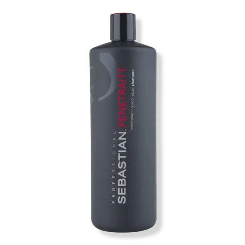 Sebastian Professional Penetraitt strengthening and repair shampoo in a black bottle.