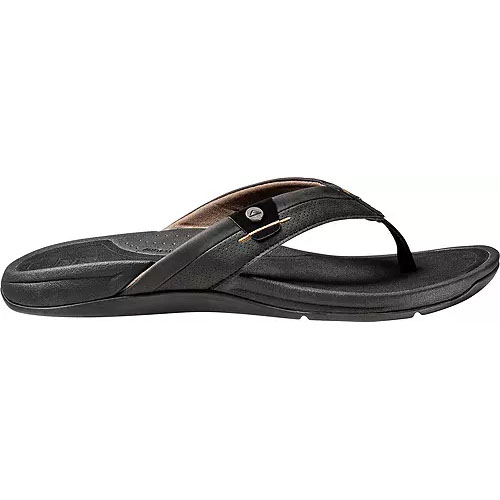 Reef Pacific Flip-Flops feature a sleek black design with wide straps and a subtle logo detail. The footbed is contoured for comfort, providing support for casual wear.