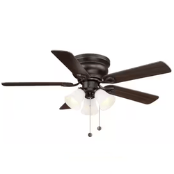 A ceiling fan with a dark bronze finish and five blades, featuring a light kit with three frosted glass shades and two pull chains for operation.