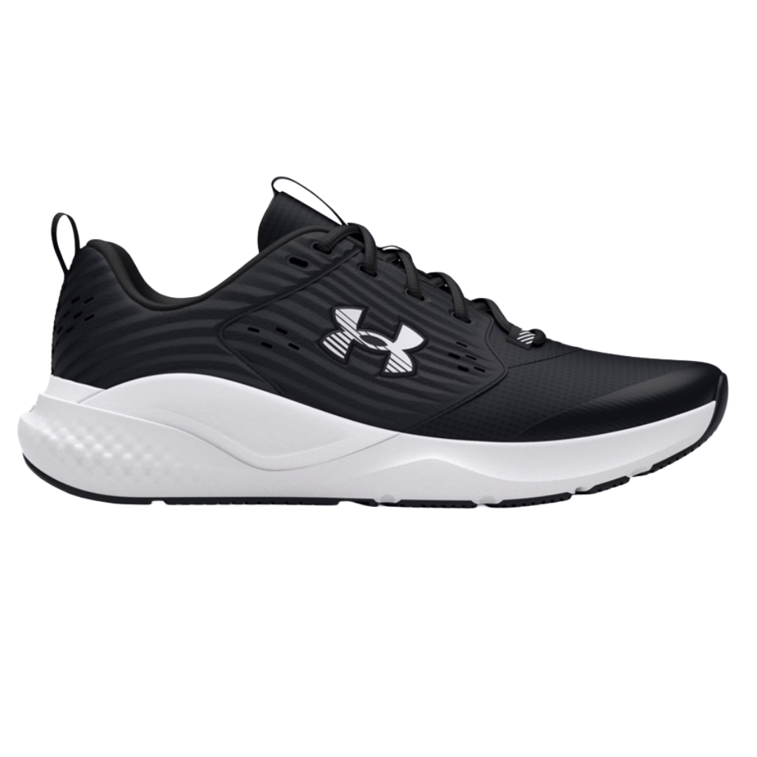 A black and white Under Armour athletic shoe with a sleek design, featuring the brand's logo on the side, a cushioned sole, and lace-up closure.