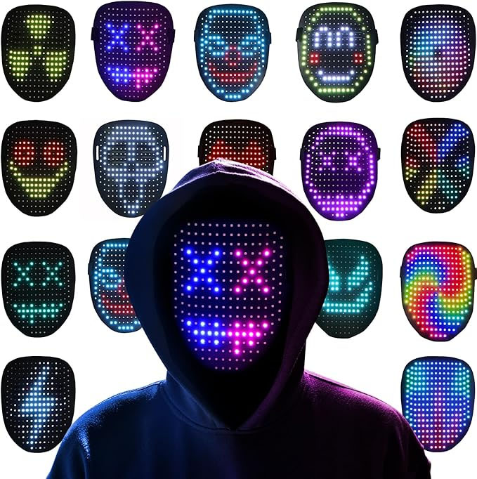 A person is wearing a hooded sweatshirt and a mask with LED lights that can display various digital patterns and designs across the mask's surface. Several LED masks with different illuminated colors and expressions surround the central figure.