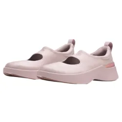 A pair of pink slip-on shoes with a wide strap and rounded design, featuring a low platform sole and a loop at the heel for easy wear.