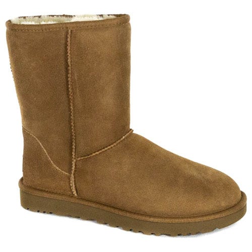 A brown suede boot with a flat sole, featuring visible stitching and a soft, plush interior lining.