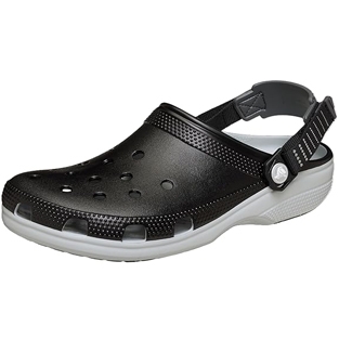 A black clog-style shoe with a white sole, featuring ventilation holes and a strap for a secure fit.