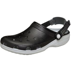 A black clog-style shoe with a white sole, featuring ventilation holes and a strap for a secure fit.