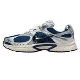 A Nike sneaker with a blue and silver mesh design, featuring a prominent black swoosh logo and a beige cushioned sole for support.