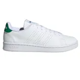 White Adidas sneaker with green detailing on the heel.