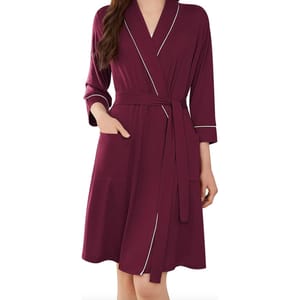 Women's lightweight robe in burgundy with white piping, features a wrap belt, three-quarter sleeves, and front pockets.