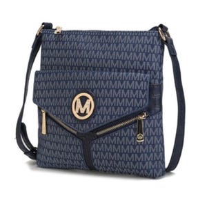 A blue crossbody shoulder bag features an \“M\“ monogram pattern with a gold-tone \“M\“ emblem and zipper details on the front pocket.