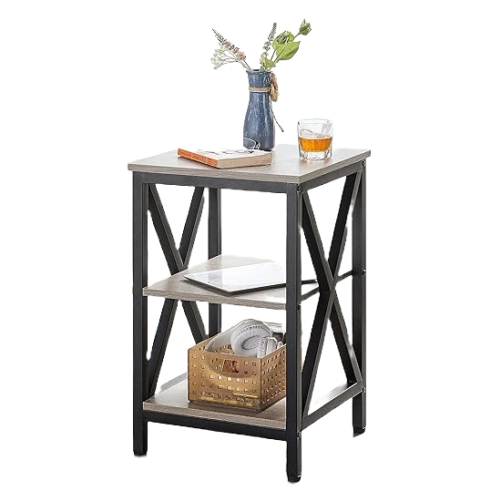 A three-tiered end table with a light-toned wooden top and shelves, supported by a black metal frame, is adorned with a blue vase, a book, and a glass.