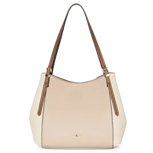 A beige tote bag with brown straps and a small logo on the front, featuring a structured design and gold-tone hardware.