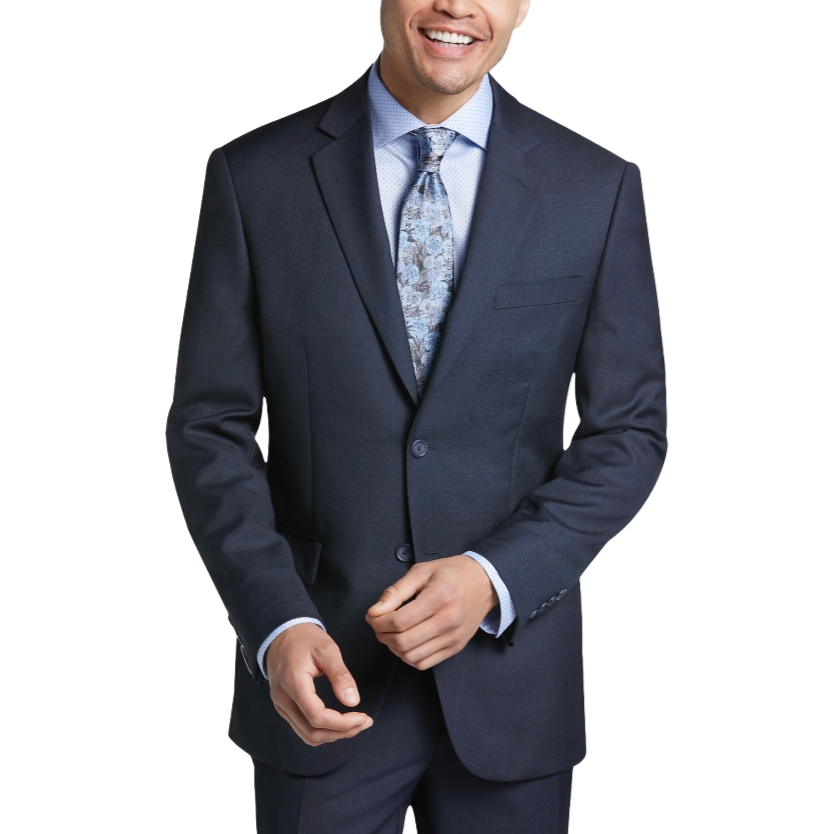 A man is wearing a dark navy suit with a light blue patterned dress shirt and a floral tie.