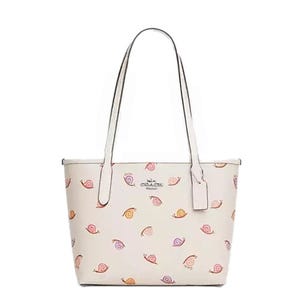 A white tote bag featuring a pattern of colorful snails with long, double straps and a central logo.