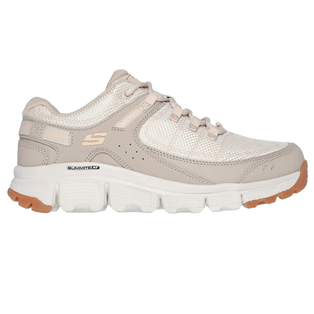 Skechers Women's Artist's Bluff Shoes feature a light beige mesh upper with synthetic overlays, a signature \“S\“ logo, and a white cushioned sole with a light brown rubber outsole.