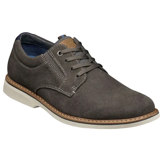 A men's casual lace-up shoe with a dark brown textured upper, white contrast stitching, a light-colored sole, and a small brown logo accent near the tongue.
