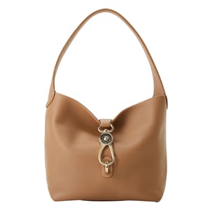 A tan leather hobo bag with a single strap and gold-tone hardware, featuring a decorative clasp detail.