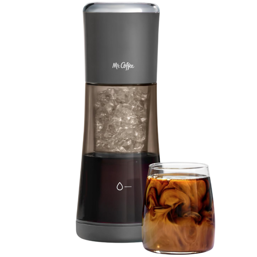 Mr. Coffee iced coffee maker with a glass of iced coffee beside it, featuring a sleek design and visible ice compartment.