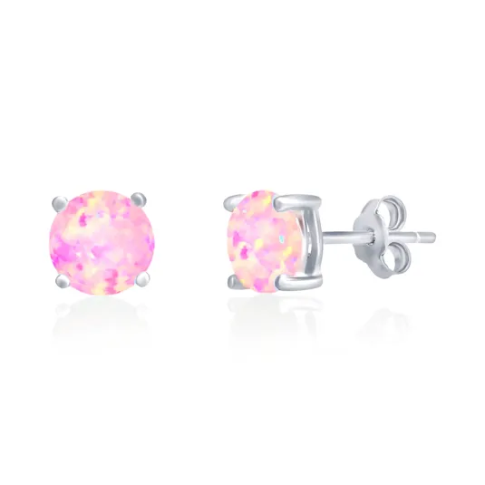 A pair of stud earrings featuring round pink opal stones set in silver prongs with push-back closures.