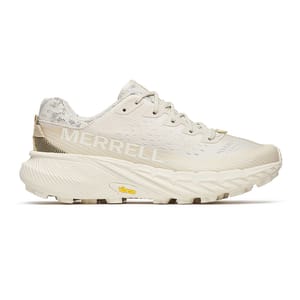 Merrell running shoe in off-white color with a chunky sole and Vibram branding.