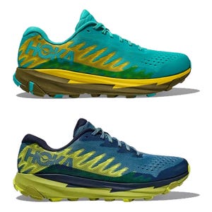 Two pairs of Hoka running shoes, one in turquoise with yellow accents and the other in navy with lime highlights.