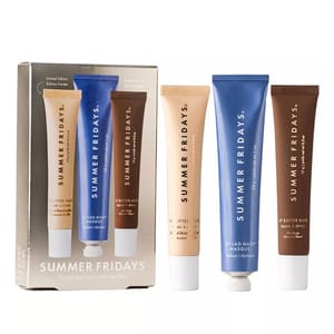 Summer Fridays The Holiday Trio includes three tubes: Butter Balm in vanilla beige and brown packaging, and Jet Lag Mask in blue.